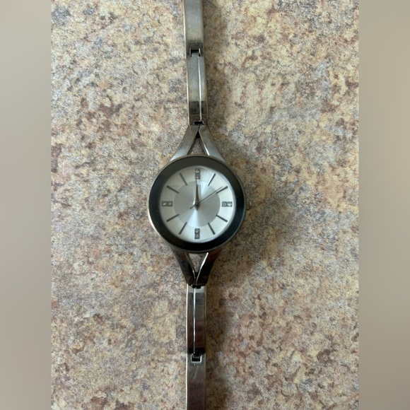 5/$25 Laura Scott silver bangle like watch. Cute and easy to wear. Pre-owned - Picture 3 of 6